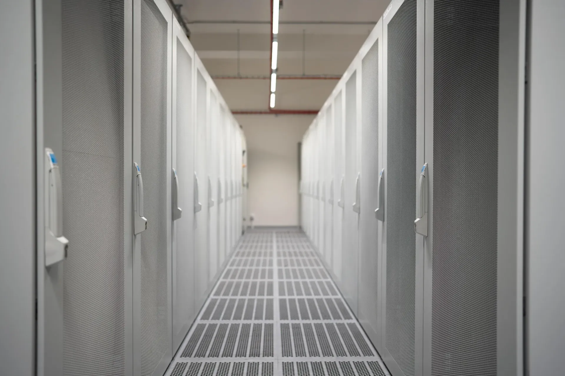 Rack rows on the datacenter floor in our Prague PoP